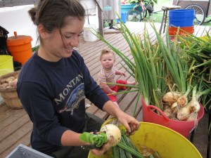 Angelica & CJ cleaning onions together